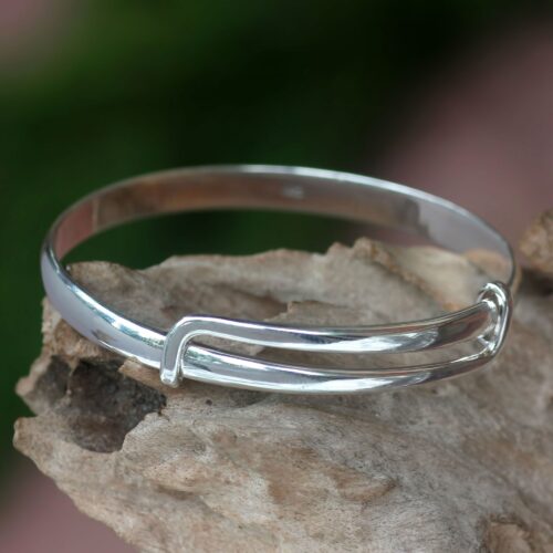 Balinese Handcrafted Sterling Silver Bangle Bracelet, 'Tender Embrace'