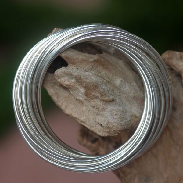 Modern Artisan Crafted Sterling Silver Bangle, 'United in Strength'