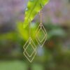 Geometric-Inspired 18k Gold-Plated Brass Dangle Earrings 'Intertwined Geometry' Geometric-Inspired 18k Gold-Plated Brass Dangle Earrings 'Intertwined Geometry'